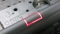 Laser engraving machine, laser engraving anodized aluminum