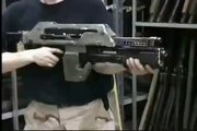 The Prop Store's Ian firing a Pulse Rifle from the sci-fi classic Aliens