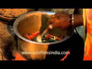 Subzi making in earthen oven, Gujarat