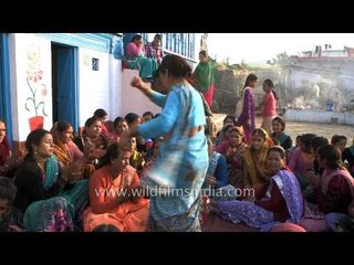 Woman dancing on Garhwali song 'Bedu pako bara masa'