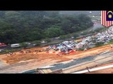 Landslide blocks traffic on a main highway of Malaysia