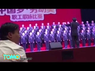 Funny choir fail: China police choir plunges 5 meters during singing competition - TomoNews