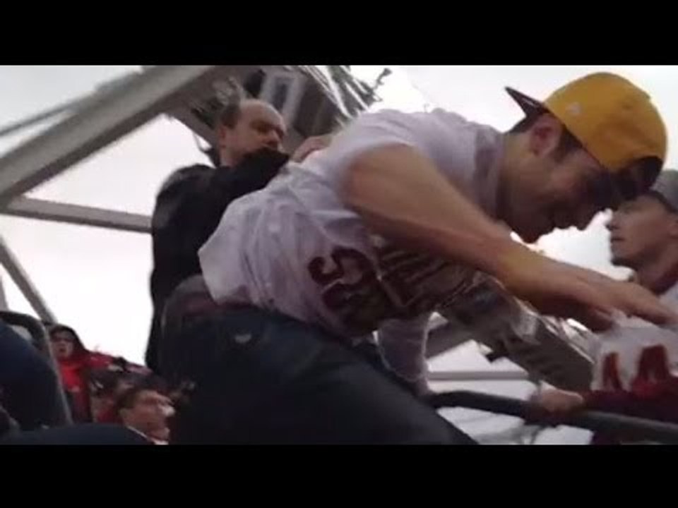 Redskins fan in 'Dallas Sucks' shirt thrown down stairs