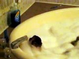 Cute Monkey Named Emily Taking a Bubble Bath