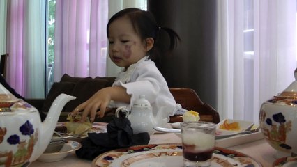 Girl Having Afternoon Tea