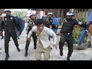 Woman shot by police during garment workers protest in Cambodia