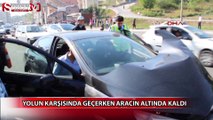 Yolun karşısına geçerken aracın altında kaldı