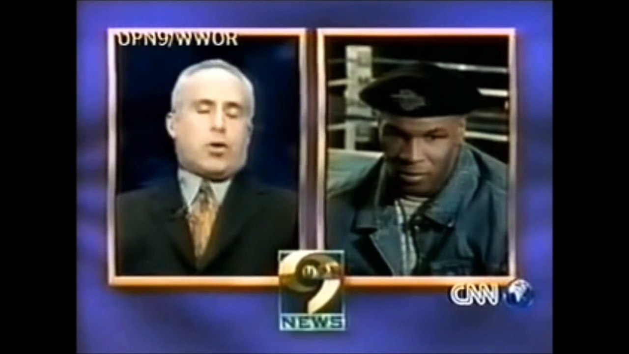 Майк Тайсон жестит в прямом эфире Mike Tyson gestures in the air