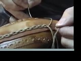 Handmade shoe making - spinning stitch close-up