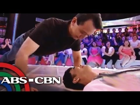 Sen. Trillanes does push-ups over Vice Ganda