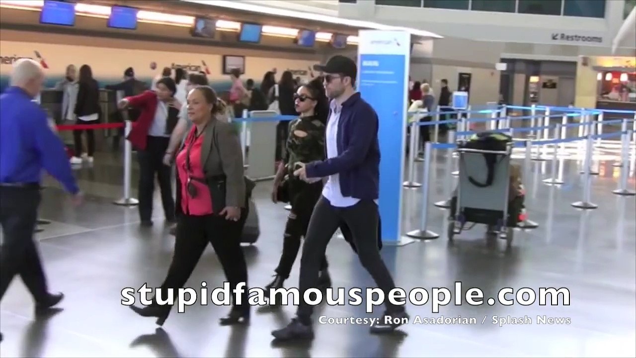 Robert Pattinson & FKA Twigs together at JFK Airport in NY