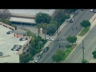 LA manhunt ensues following shooting attack on two detectives