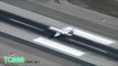 Emergency landing: Plane lands on belly at Los Angeles International Airport - TomoNews