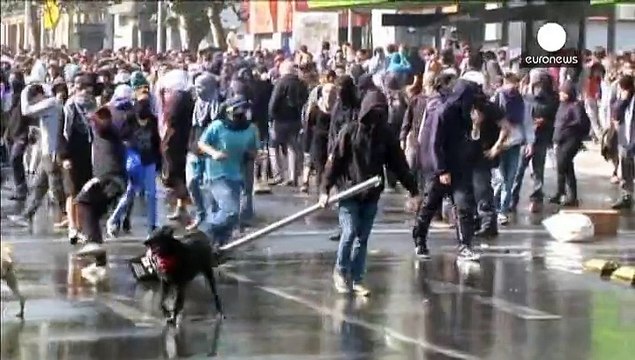 Чили: хозяин магазина застрелил студентов, вешавших баннер