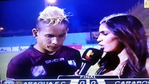 Venezuelan footballer kicked by rival fan during live interview