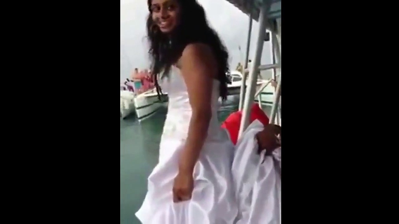 Heart-stopping moment bride almost drowns after jumping in ocean for 'trash the dress' stunt