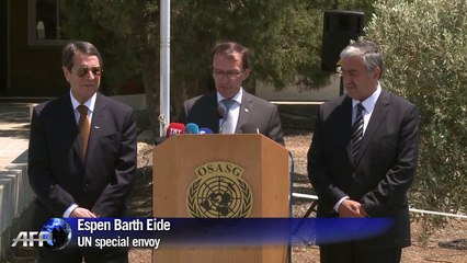 Peace talks in divided Cyprus resume in "climate of optimism"