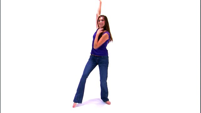 Shot of a girl in a purple shirt and jeans dancing.