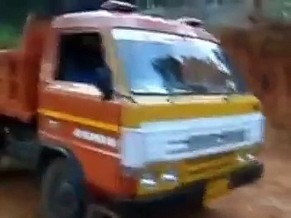 12 year old kid driving  tipper