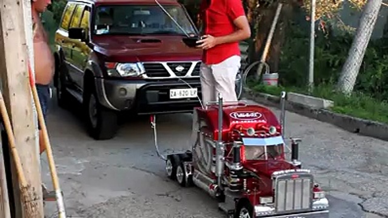 world smaller touching car