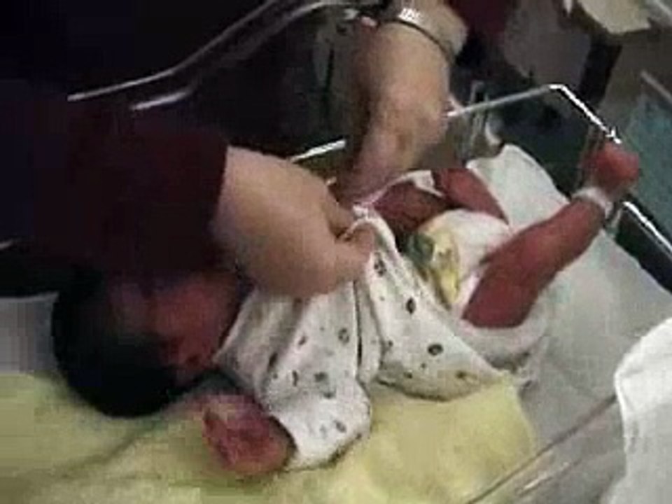 Baby getting dressed