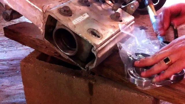 How to replace rear wheel bearings on a Suzuki LZT 400 PART 2. Putting it together