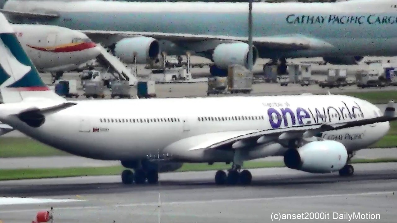 Cathay Pacific Airbus A330. "One World" Livery. Takeoff from Hong Kong Airport