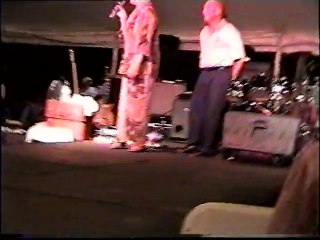 Lady sings 'Wooden Heart' at Elvis Week 2005 video