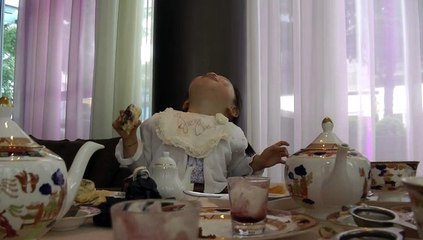 Girl Having Afternoon Tea