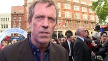 George Clooney and Hugh Laurie banter at premiere