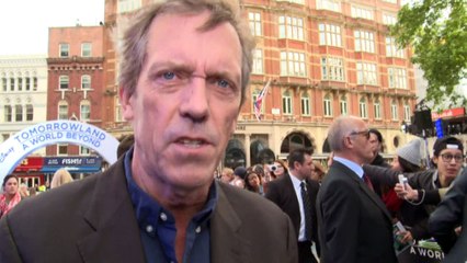 George Clooney and Hugh Laurie banter at premiere