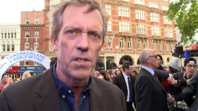 George Clooney and Hugh Laurie banter at premiere