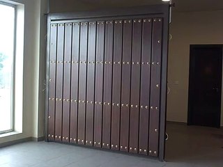 Puerta Automatica Basculante no desbordante. Puertas Cifuentes