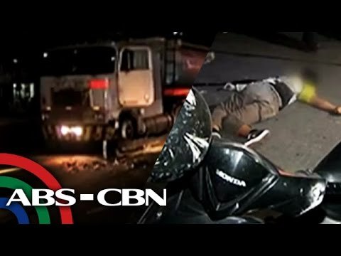 Motorcycle driver falls off vehicle, dragged by truck