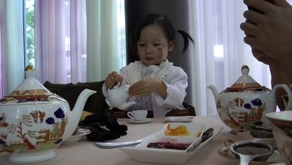 Girl Having Afternoon Tea*
