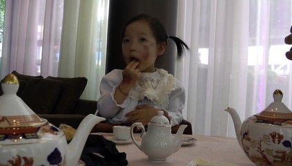 Girl Having Afternoon Tea*