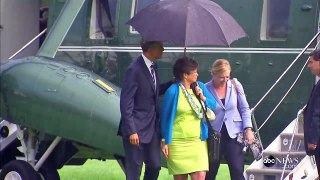 What happens when you're the president of the United States, it's raining and you're the only one with an umbrella?
