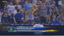 Terrible Royals fan catches a fly ball, gives it to a kid, asks for it back