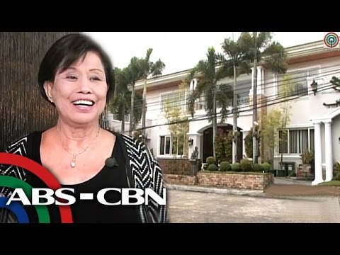 Mother Lily shows off house