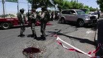 Palestinian car rams 2 Israeli police, driver shot dead