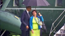 What happens when you're the president of the United States, it's raining and you're the only one with an umbrella