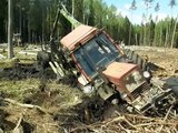 Belarus Mtz 82 forest tractor stuck in mud, saving