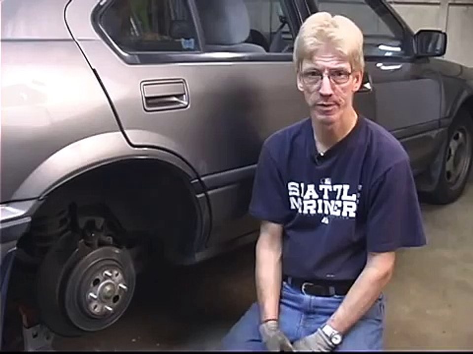 How to Replace Rear Brake Pads : Removing the Rotors