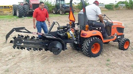 Bradco Model 330 Trencher attached to a Kubota BX2660RV tractor