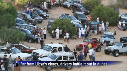 Far from Libya's chaos, drivers battle it out in dunes