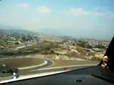 Cockpit view of a jet landing in Tegucigalpa, Honduras. Full landing