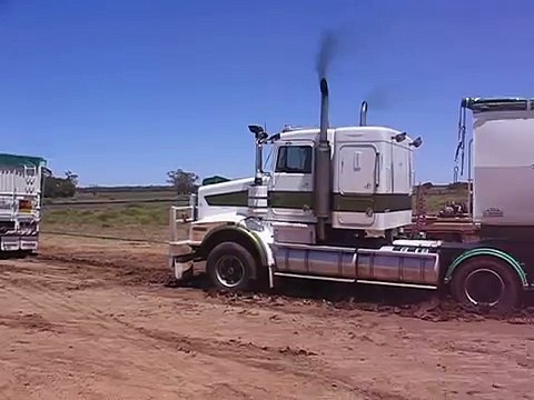 Kenworth SAR with 8V92 pulling out a bogged T650 Road Train