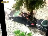 Crazy Hail Storm... And Crazy Guy Trying To Protect His Car