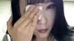 Korean woman removing makeup