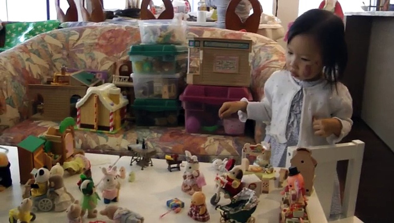 Girl And Sylvanian Families